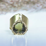 Wide gold ring with heart shape moldavit