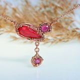 Rose gold necklace with rhodonite and sapphires