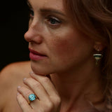 Gold ring with Swiss blue topaz in “mandala” cut