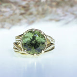 Gold ring with big round moldavit