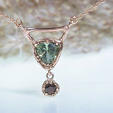 Rose gold necklace with moldavit and bohemian garnet